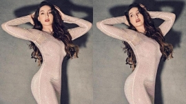Nora Fatehi rocks the `80s power shoulder trend