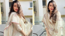 Karisma Kapoor`s ivory anarkali with printed dupatta is winning hearts