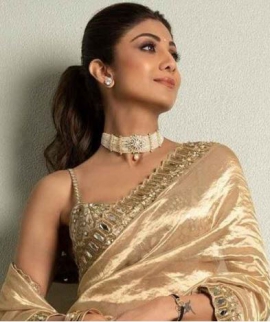 Shilpa Shetty slays in Arpita Mehta’s gold saree but her early 2000s puff ponytail has our attention