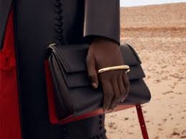 This is the newest addition to Alexander McQueen’s collection of Story handbags