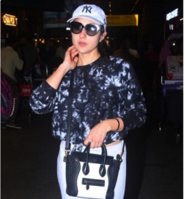 Sara Ali Khan serves fashion goals with her airport look as she carries a Celine monochrome handbag in style