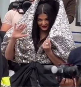 Aishwarya Rai Bachchan`s dramatic Cannes 2023 outfit sparks meme fest: `She is hiding Aaradhya inside`