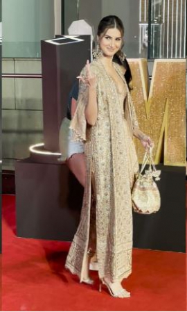 Tara Sutaria`s gorgeous subdued golden outfit with matching potli bag is perfect for Diwali parties