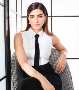 Kriti Sanon is a black-tie girl as she serves fierceness in a midi-dress with side slit