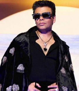 Karan Johar returns as Nandita Mahtani’s showstopper in black velvet pants and blazer with silver embroidery