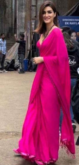 Kriti Sanon channels her inner Rani in a vibrant pink saree while promoting Teri Baaton Mein Aisa Uljha Jiya