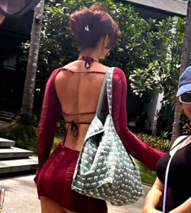 Disha Patani flaunts her celestial curves in distressed burgundy dress with matching bikini set